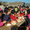 Children were enjoying rice and curry